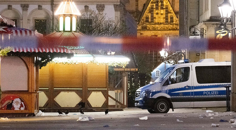 Ein Absperrband der Polizei hängt vor dem Eingang zum Weihnachtsmarkt. Foto: picture-alliance/dpa|Sebastian Kahnert