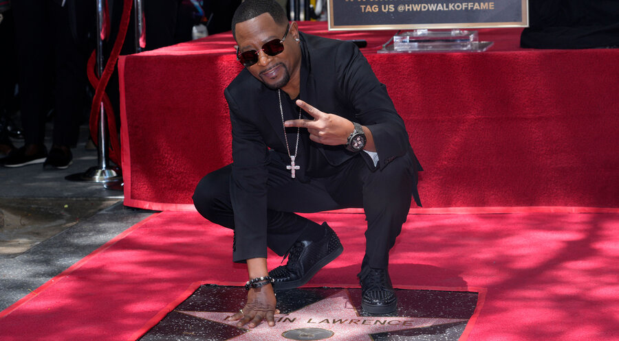 Der US-Schauspieler Martin Lawrence neben „seinem Stern“. Foto: Picture Alliance/Chris Pizzello