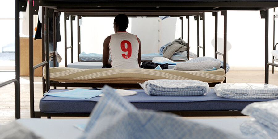 Ein Asylbewerber in einer Münchener Flüchtlingsunterkunft. Foto: picture-alliance/dpa