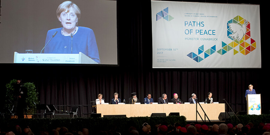 Bundeskanzlerin Angela Merkel (CDU) sprach bei der Auftaktveranstaltung des Internationalen Friedenstreffens unter dem Thema „Wege des Friedens“. Foto: picture-alliance/Guido Kirchner/dpa